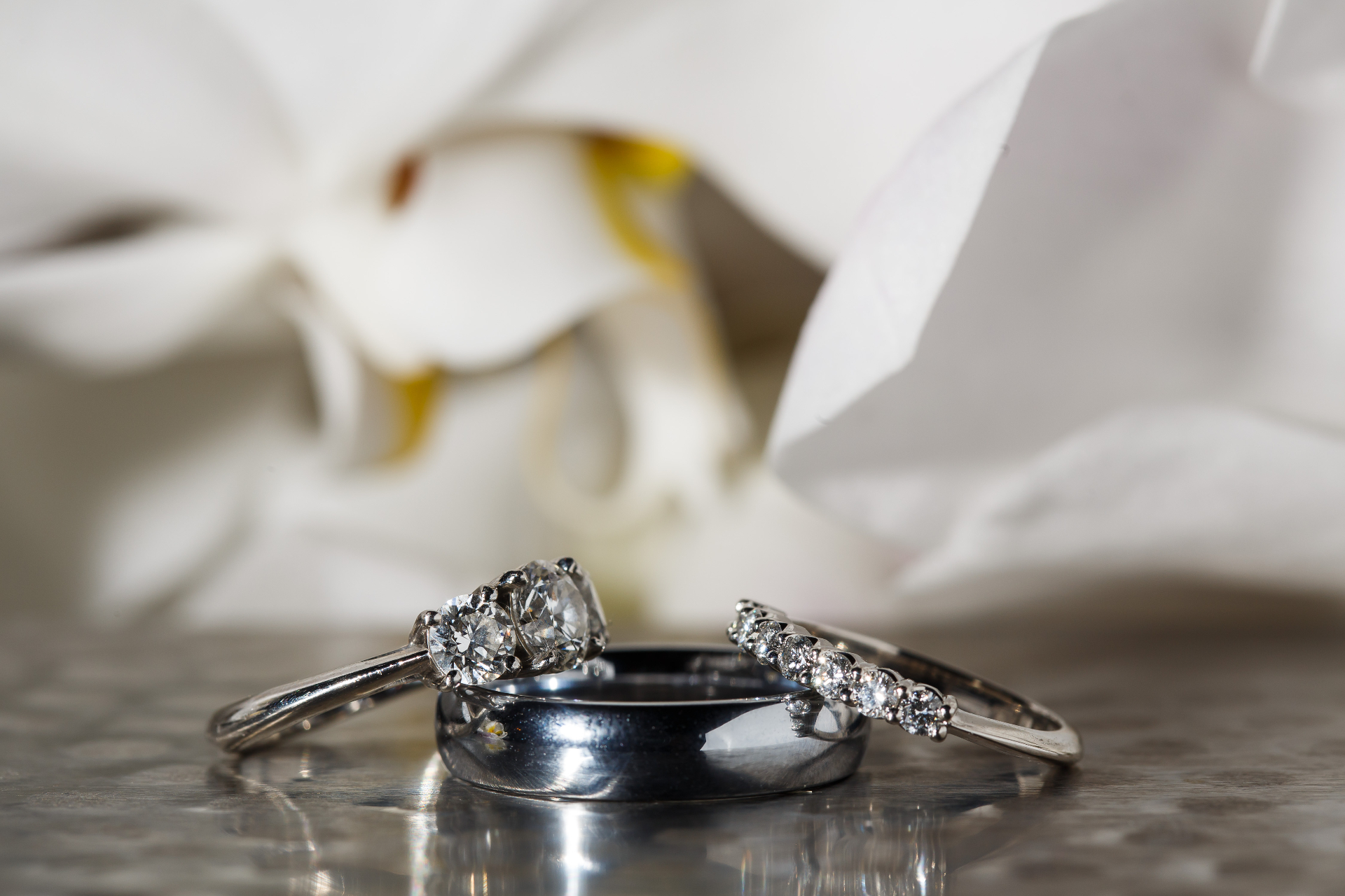 Wedding rings with white orchids